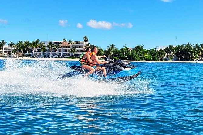 Best Cozumel Jet Ski Tour + Drinks + Snorkeling - Riding north from San Francisco Beach Club