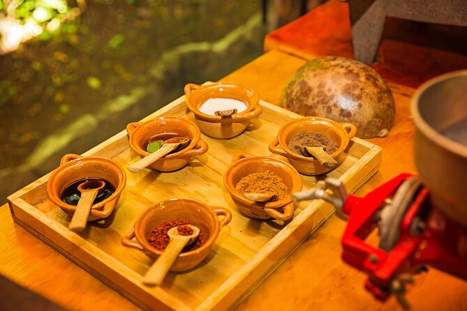 Chocolate Workshop - Grinding cacao with a mortar and pestle