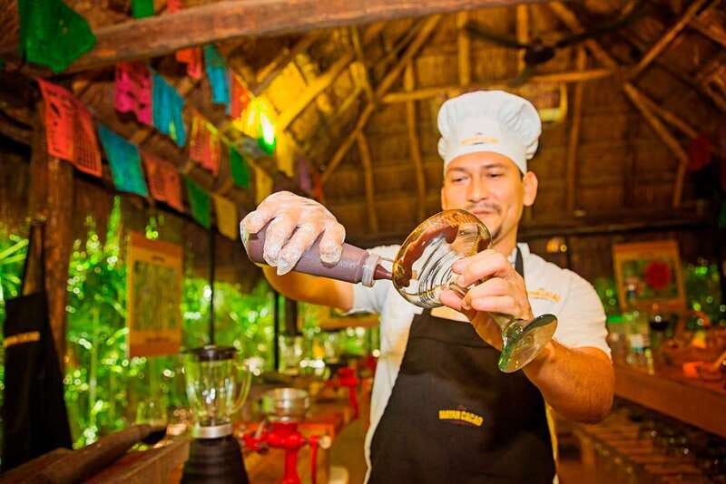 Cozumel: Chocolate Margarita Workshop with Mayan Recipe - Grinding cacao and making a chocolate bar