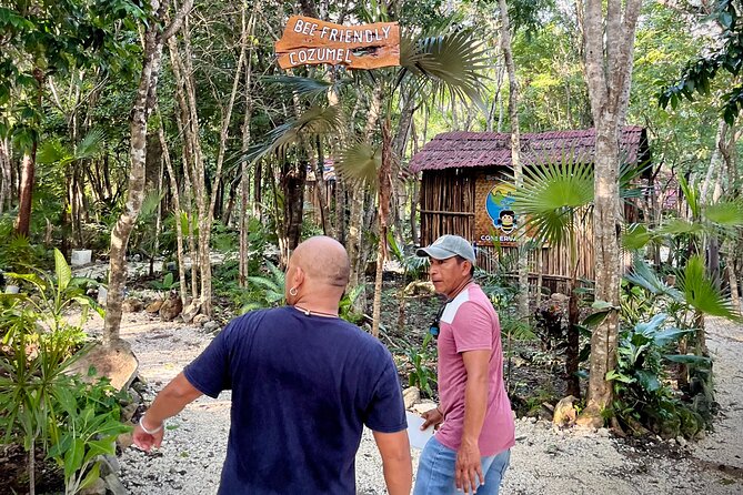 Cozumel: Hands-On Chocolate, Tortilla, Salsa & Honey Experience - Making chocolate with Mayan stone tools