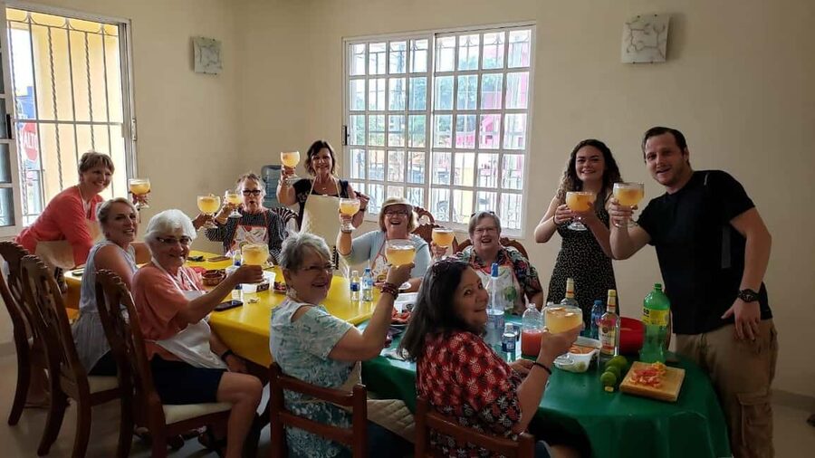 Cozumel: Private Cooking Class in a Family Kitchen - Sitting down to eat at the family table