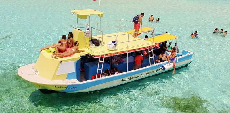Cozumel: VIP Glass Bottom Boat & Snorkeling 3 Reefs Tour - What happens on the boat