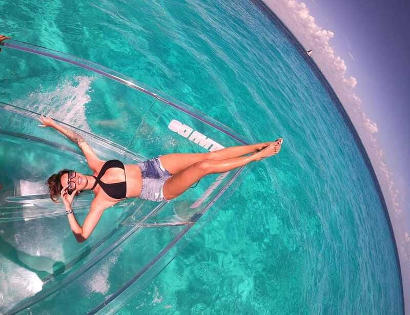 Explore the sea of cozumel in a transprent boat with drinks and snorkel. - Watching Wrecks, Coral, and Fish Through the Floor