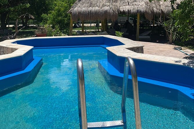 Off Road into Jungle to Mayan Caves, Hidden Ruins & Snorkel Tour - Cooling off at Cenote Aerolito de Paraiso