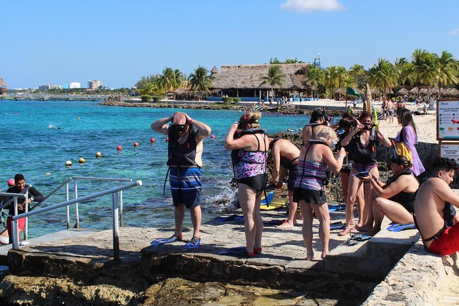 Official Chankanaab Beach Park Day pass with Snorkel - The beach setup: shade, chairs, and hammocks