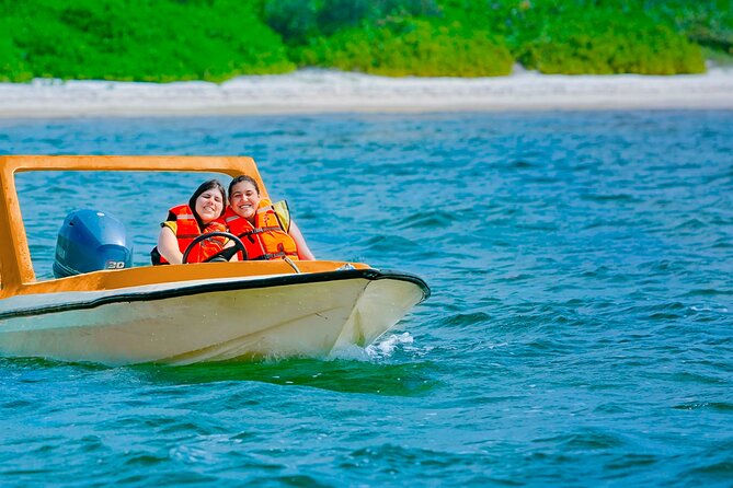 Speed Boat Snorkeling and Beach in Cozumel - Snorkeling in shallow water