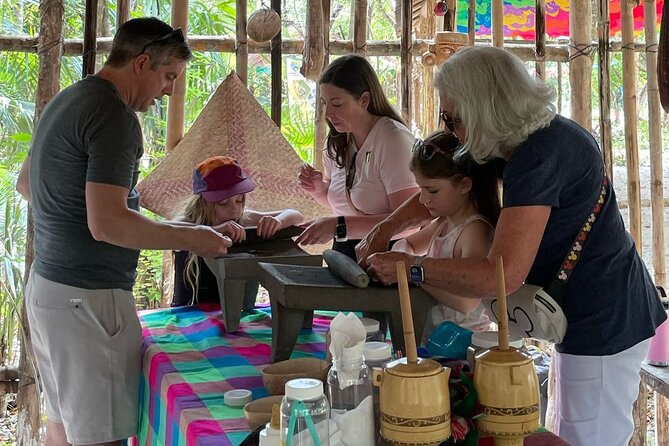 Tierra Maya – Sanctuary of Living Mayan Traditions - Grinding cacao with stone tools