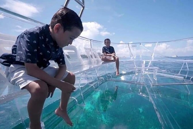 Transparent Boating and Snorkeling Tour in Cozumel All Inclusive - The practical walk from the shop to the pier